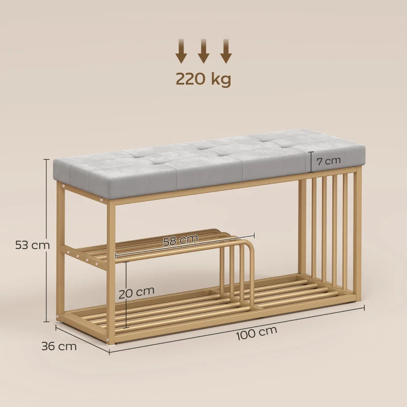 Grey upholstered shoe storage bench with tufted seat and gold steel frame, two shelves