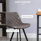 Dark grey microfiber bar stool with diamond-stitched quilting on padded seat and back