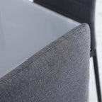 Grey high-back chair backrest with smooth linen-touch upholstery texture