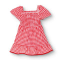Pink gingham baby dress with shaped neckline, short puff sleeves, and tiered ruffle hem