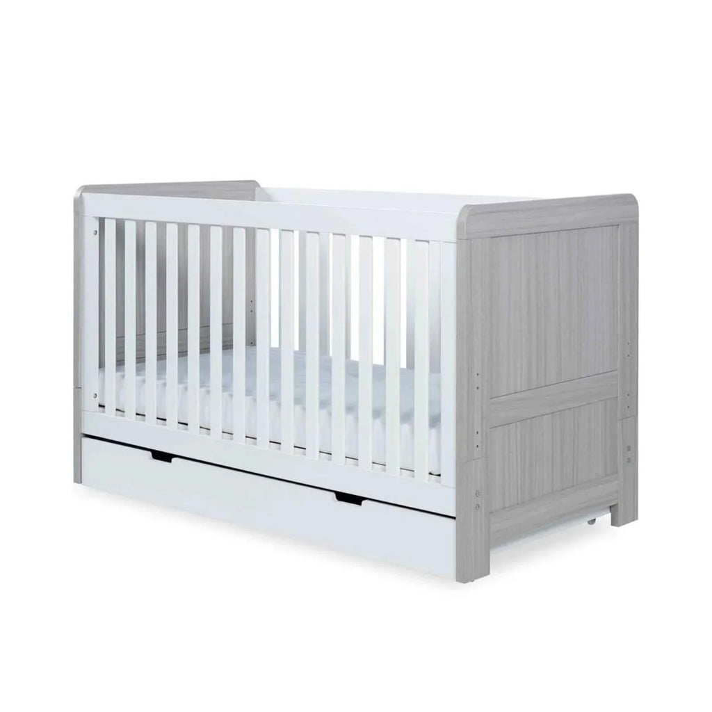 Grey-and-white baby cot with vertical slats and solid side rails