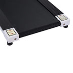 Walking pad treadmill belt deck with white end caps and stable black rubber feet