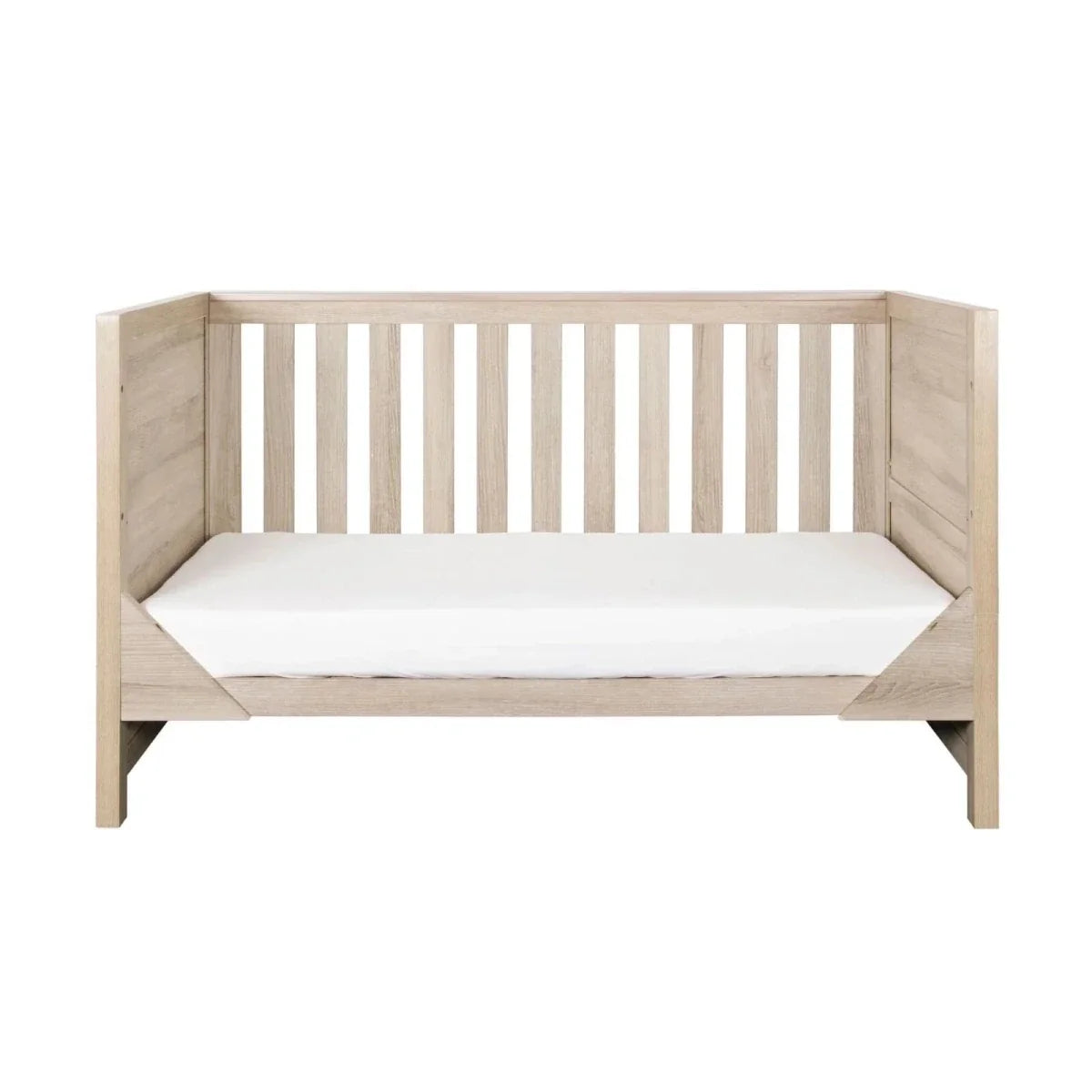 Oak baby cot with slatted sides and white mattress