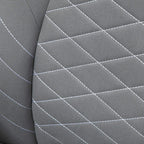 Light grey quilted upholstery panel with diamond stitch lines
