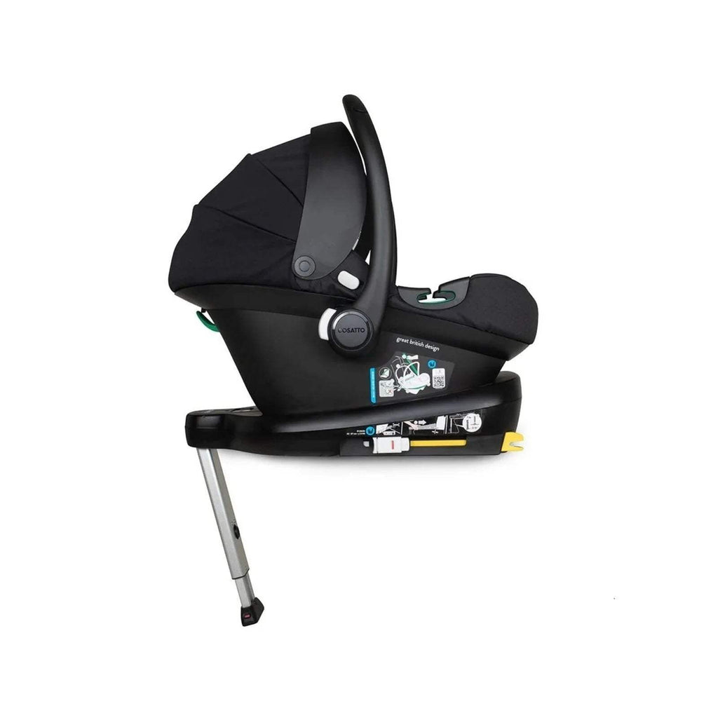 Black infant car seat with canopy mounted on base