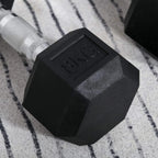 Black hex rubber dumbbell end with embossed weight mark and chrome handle