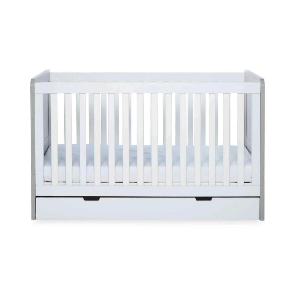 Grey-and-white baby cot front view with vertical safety bars
