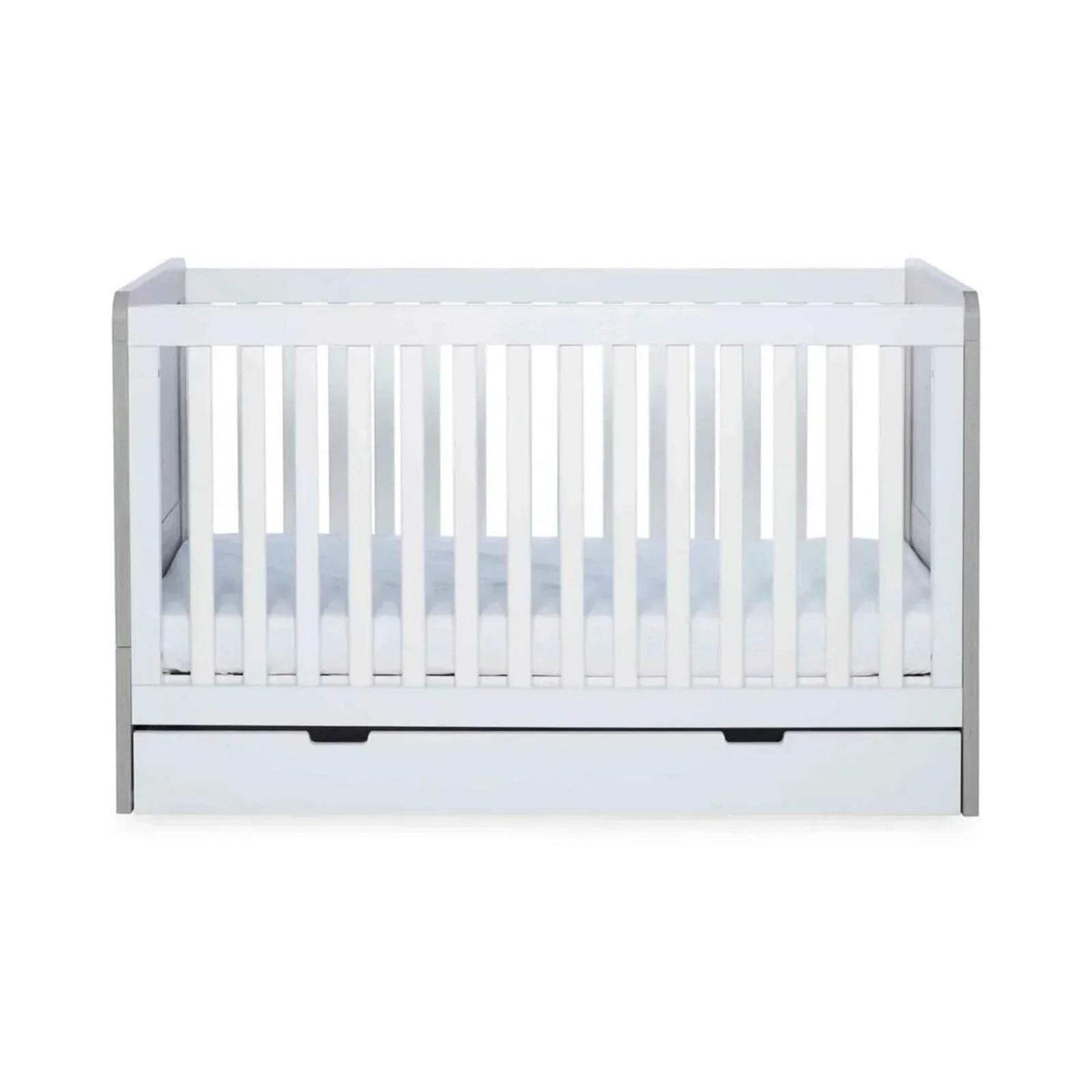 Front view of ash grey and white baby cot with vertical rail paneling
