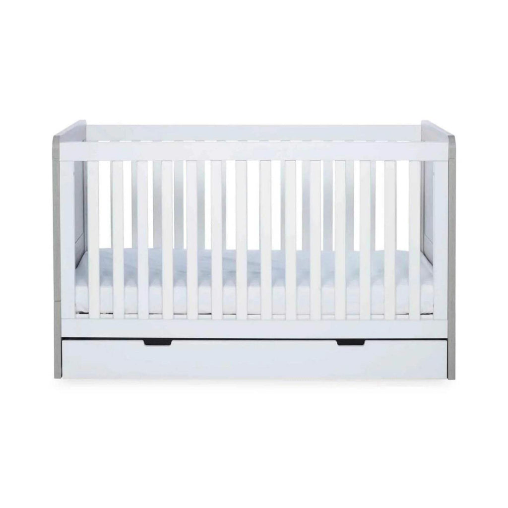 Ash grey and white cot bed front view with vertical safety rails