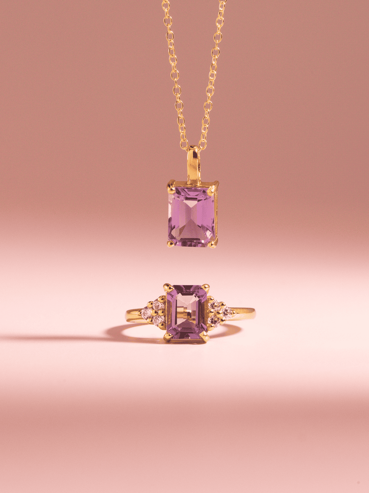 Lavender amethyst emerald-cut ring with side stones and matching pendant