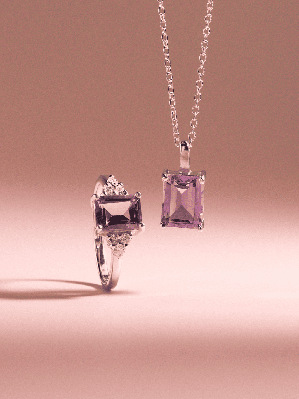 Sterling silver pendant with lavender emerald-cut gemstone on chain