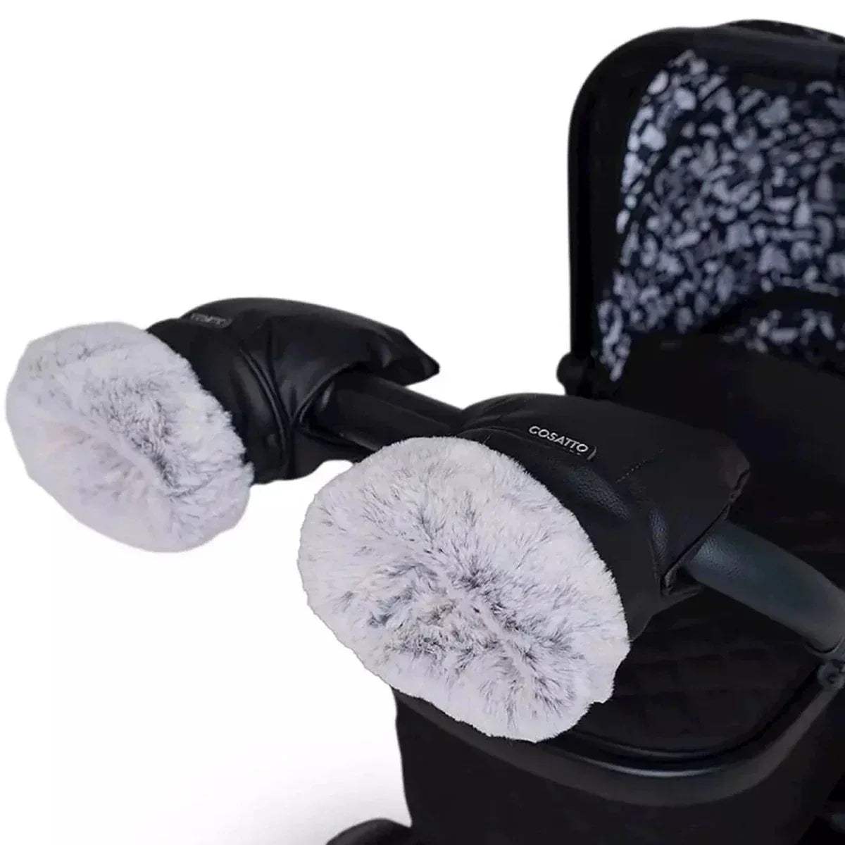 Heated snuggle mitts in black with gray plush cuffs, placed on stroller handle