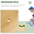 Natural wood raised planter bed with circular drainage hole on the side panel