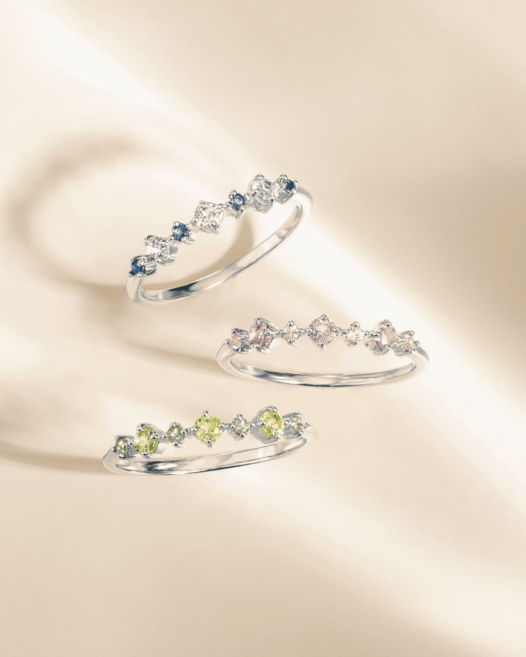 Stackable sterling silver rings: blue oval stones and green stones