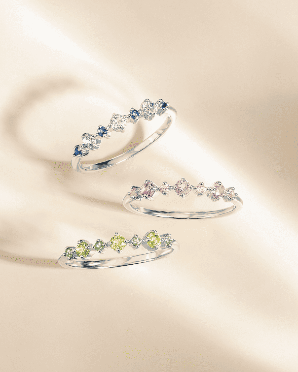 Stackable sterling silver rings: blue oval stones and green stones