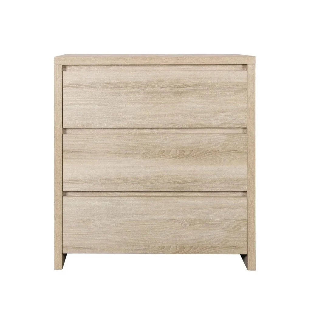 Oak changing unit with three stacked drawers, light wood grain and flat top.