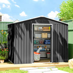 Dark grey galvanised steel shed with open double door and boxed storage items inside