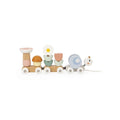 Wooden snail train toy with flower and heart pieces on small rolling wheels