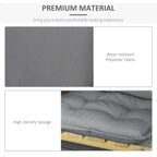 Dark grey chair cushion fabric texture with thick high-density foam padding, close-up