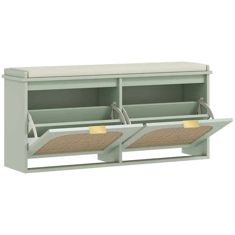 Light green shoe bench with padded flip-seat and open storage with rattan dividers
