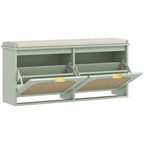 Light green shoe bench with padded flip-seat and open storage with rattan dividers