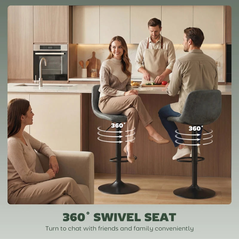 Green 360° swivel bar stool with curved upholstered seat and round pedestal base