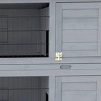 Grey rabbit hutch close-up of wire compartment edge and side door latch