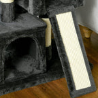 Black plush cat tree scratching board with sisal-wrapped vertical post close-up
