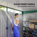 Green metal shed with clear front panels letting natural light inside