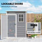 Grey storage shed with lockable doors, window, and key lock hardware