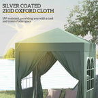 Green pop-up gazebo with open front and white window panels on side walls