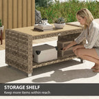 Outdoor coffee table with storage shelf and rattan sides, shown with open compartment