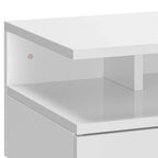 White floating bedside table close-up showing open compartments and drawer front