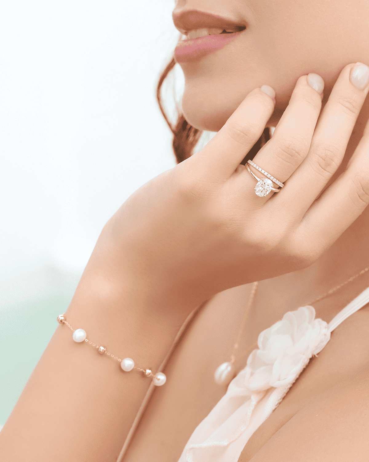 Gold vermeil freshwater pearl bracelet with round white pearls, close-up on wrist