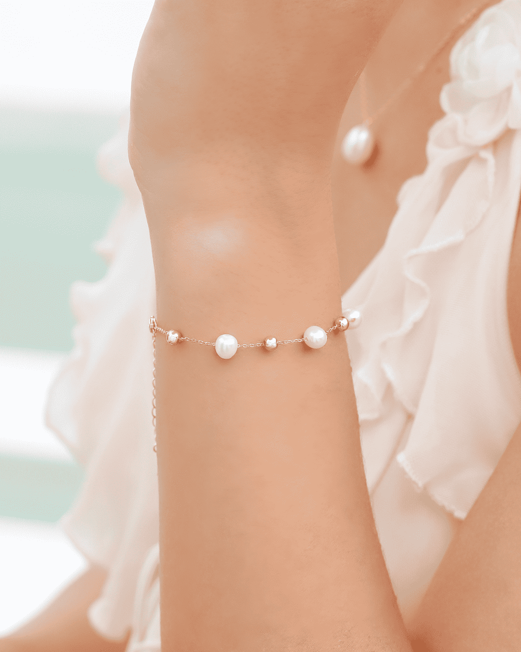 Delicate gold vermeil pearl bracelet with small round white beads on fine chain