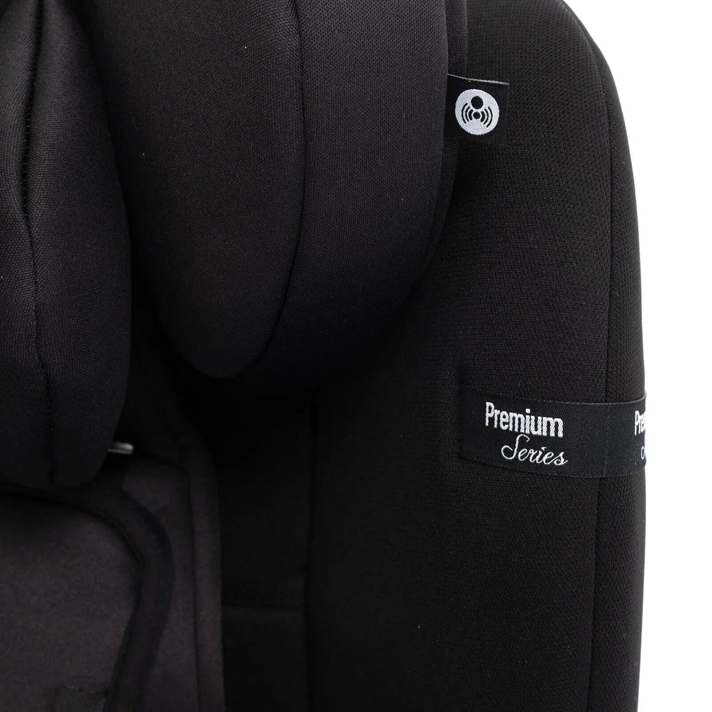 Black car seat padding with Premium Series badge on side panel