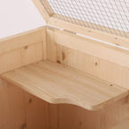 Natural wood interior platform shelf with open compartments inside a 4-tier cage