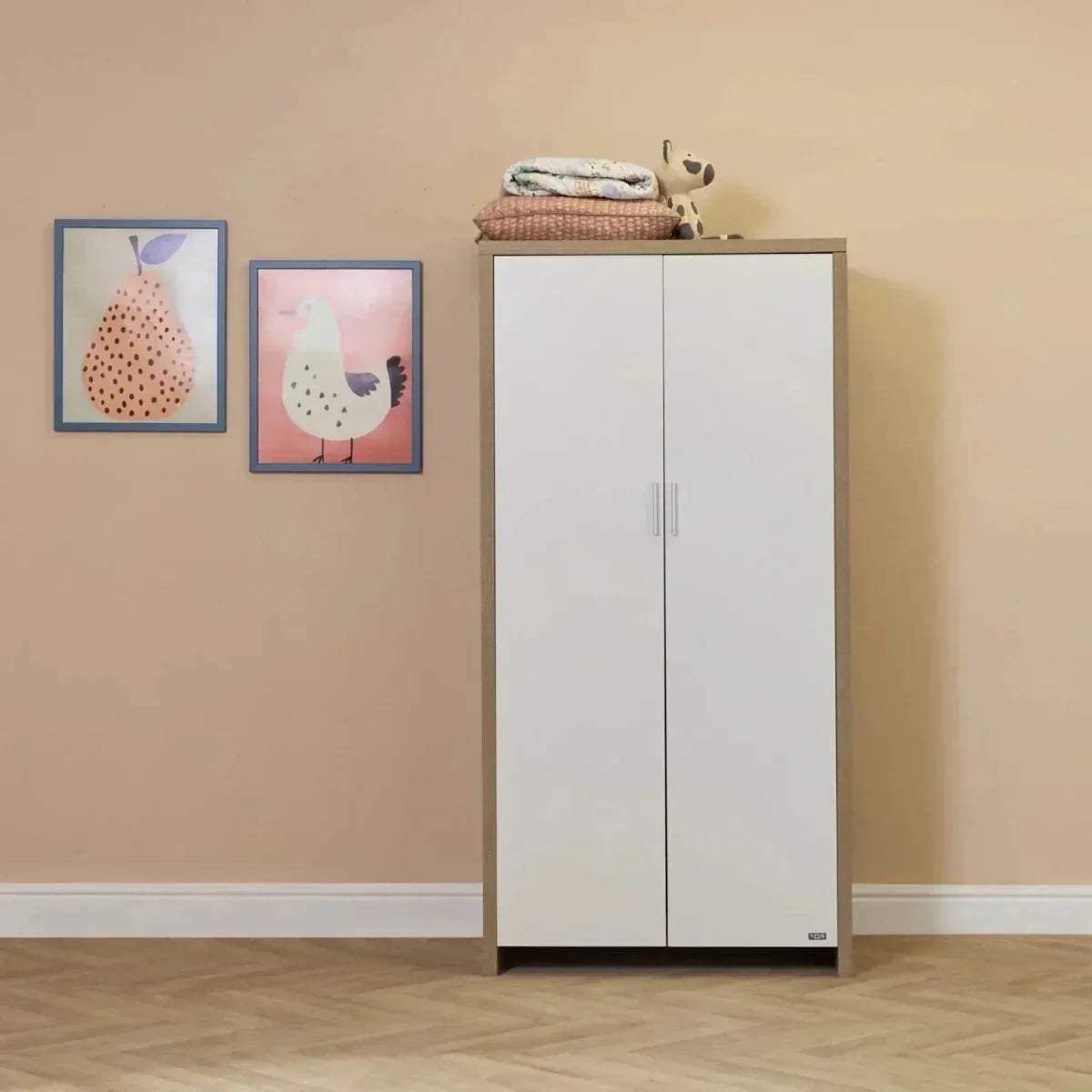 White wardrobe with light-oak top and vertical handles, part of baby room set.