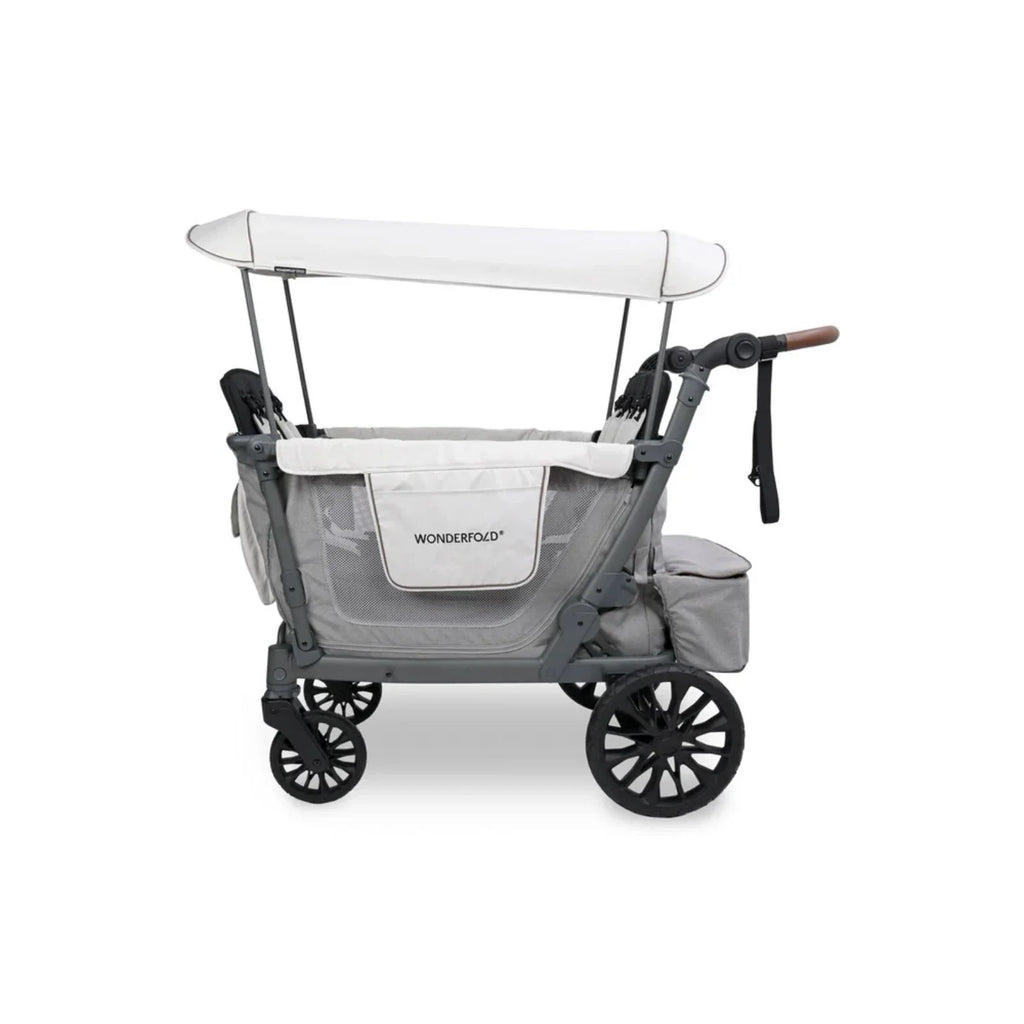 Grey stroller wagon with canopy, two front wheels, and padded seat frames
