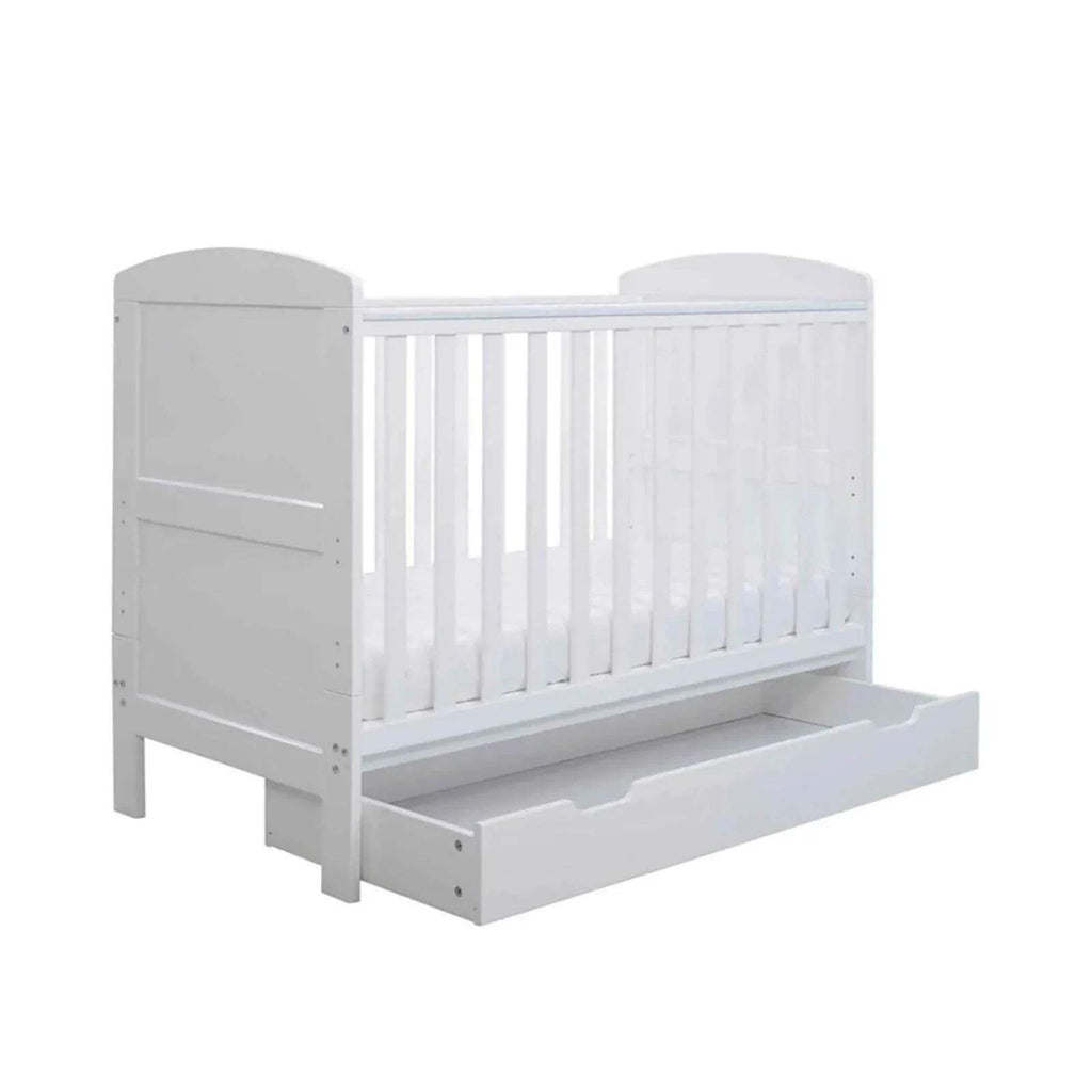 White mini cot bed with side frame and under-drawer drawer front