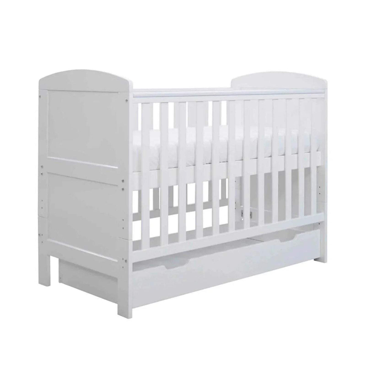 White mini cot bed with vertical rails and under-drawer panel, front-right view