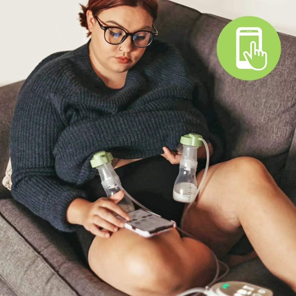 Electric breast pump with two collection bottles and controller connected by tubing