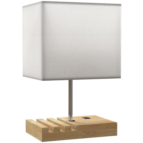 White fabric bedside table lamp with drum shade and solid wood base with phone stands