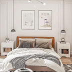 White nightstand set of two in bedroom, each with drawer and open shelf.