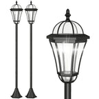 Black solar lantern pathway light post with curved glass panels and decorative top.