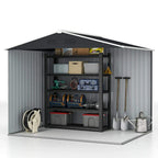 Grey metal garden shed interior with storage shelves behind open double sliding door.