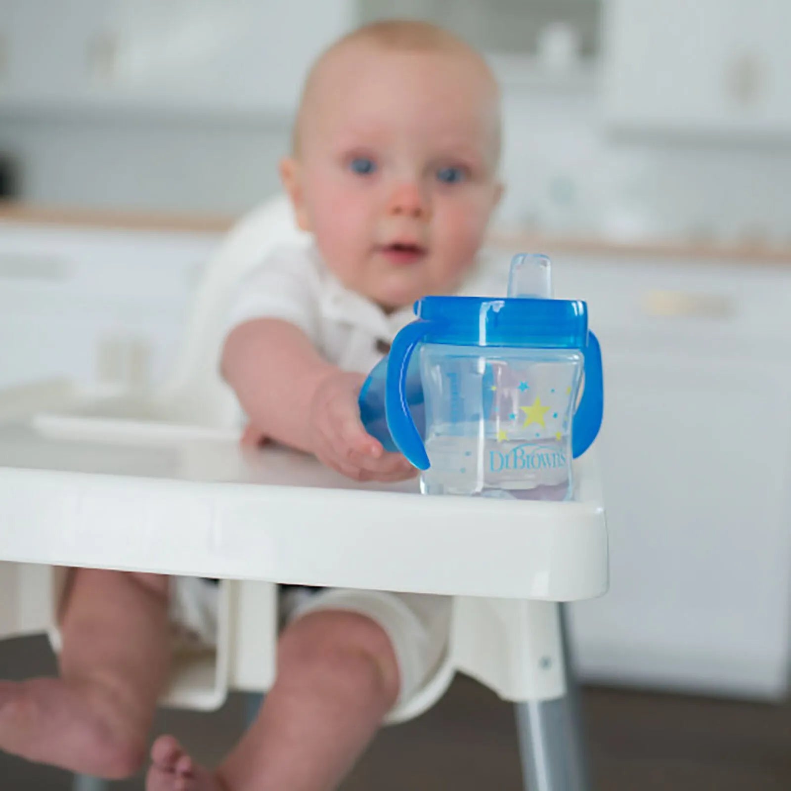Blue soft spout transition cup with handles and star print, Dr. Brown's logo