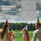 Reversible outdoor rug top view with grey-and-cream chevron pattern