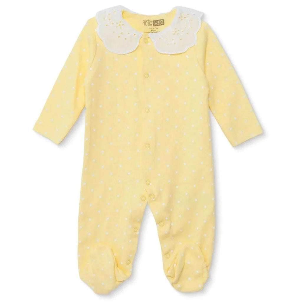 Yellow polka-dot long-sleeve baby sleepsuit with footies and snap closure