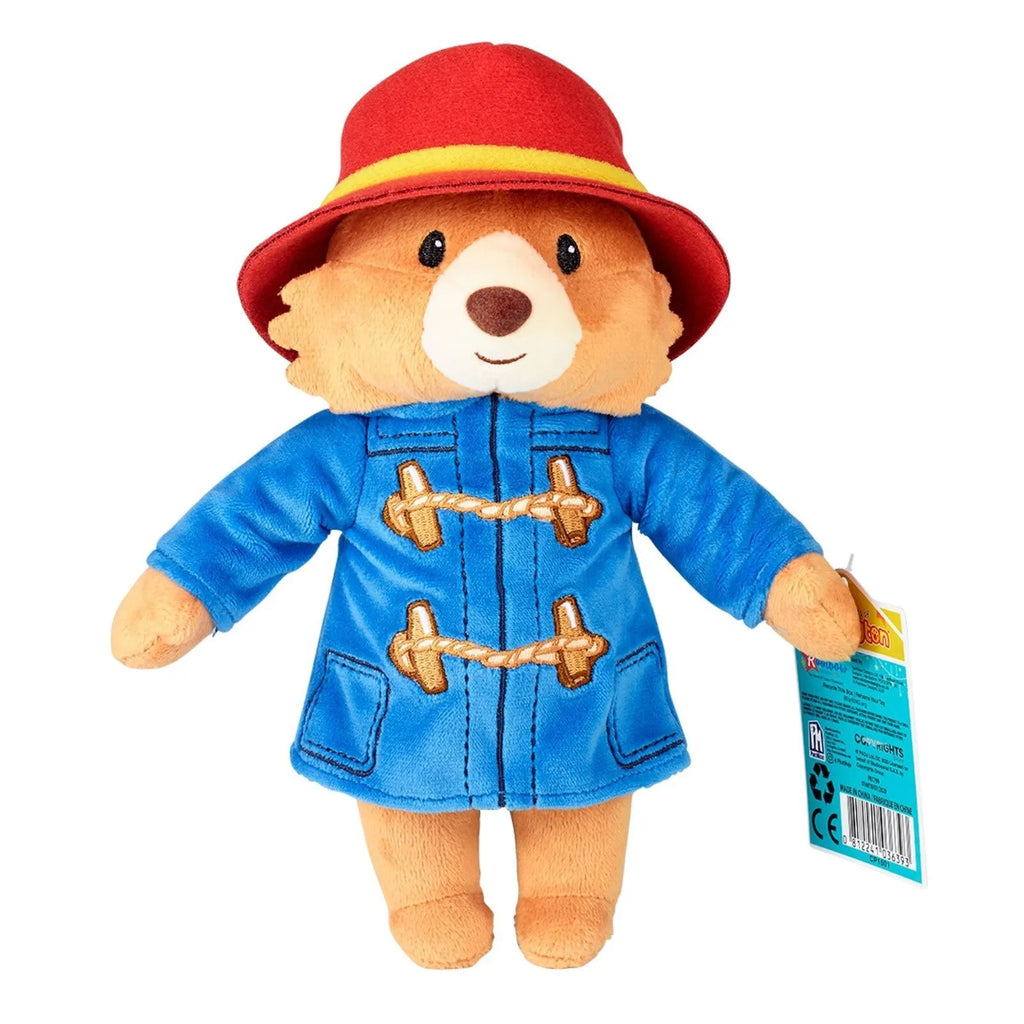 Collectible Paddington plush bear in red hat and blue coat, gold toggles